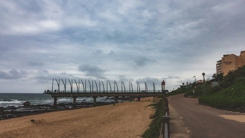 Pier and lighthouse - Ад Promenade, South Africa